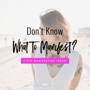 girl on beach with text Don't Know What To Manifest? 7 Fun Manifesting Ideas!