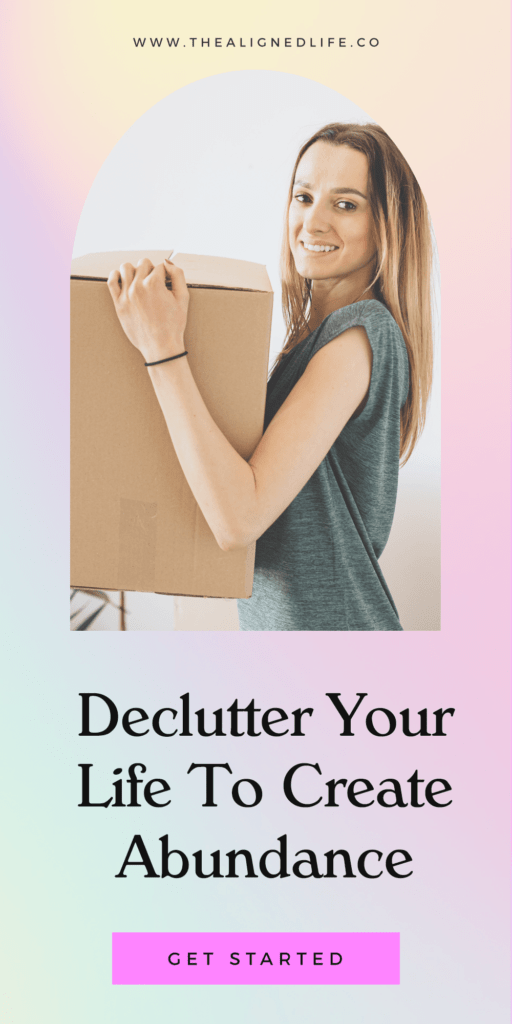 woman holding a box with text Declutter Your Entire Life To Create Abundance