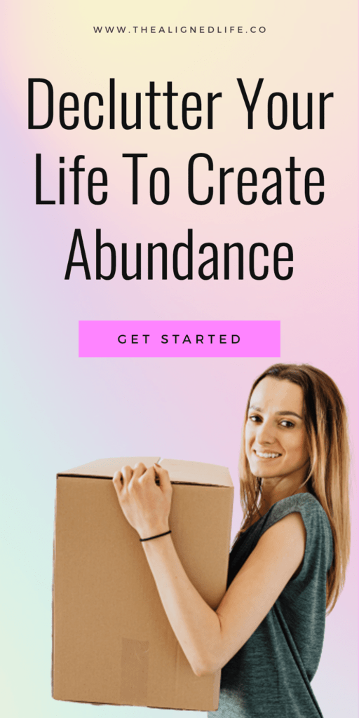 woman holding a box with text Declutter Your Entire Life To Create Abundance