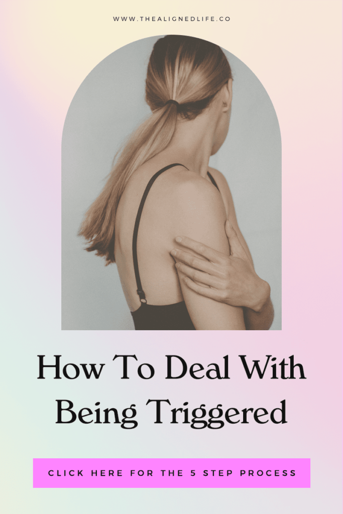 woman hugging herself with text How To Deal With Being Triggered