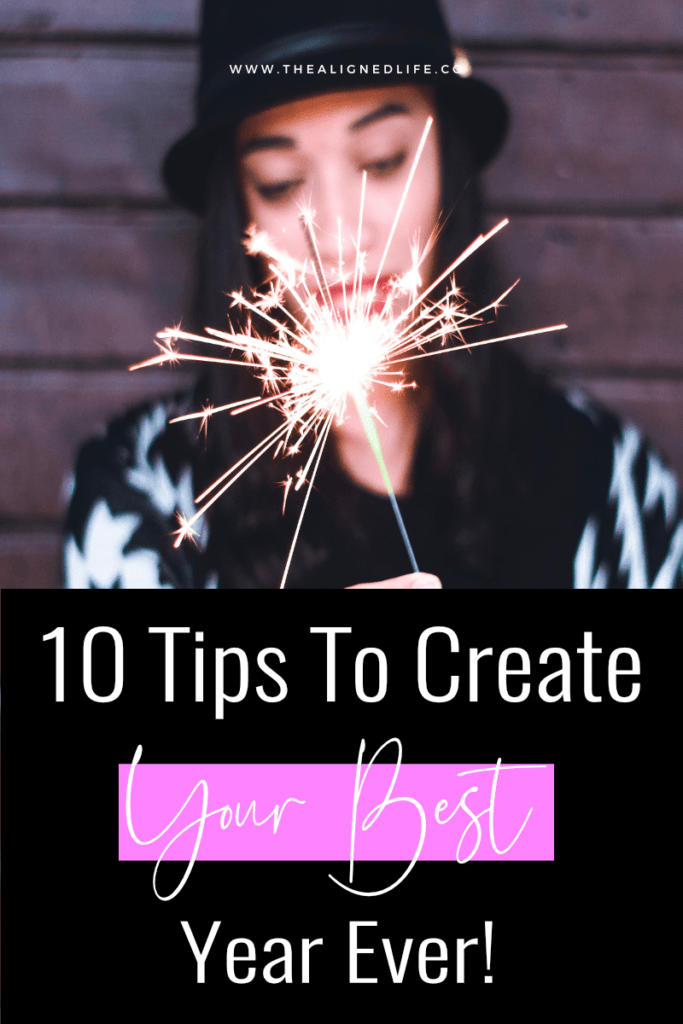 woman with sparkler & text 10 Steps To Create Your Best Year Ever | The 2022 Guide