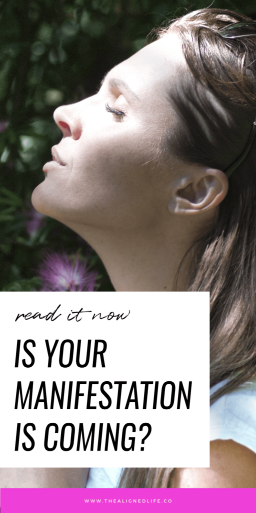 brunette woman with a flower | Signs Your Manifestation Is On Its Way | The Aligned Life Manifestation Blog