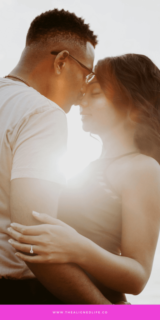 woman and man kissing in the sunshine | 111 Affirmations To Manifest Your Ex Back | The Aligned Life Manifestation Blog