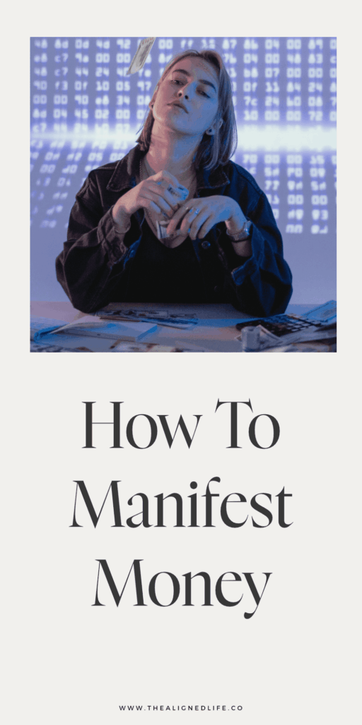 woman sitting a desk throwing money in the air | How To Manifest Money | The Aligned Life Manifestation Blog