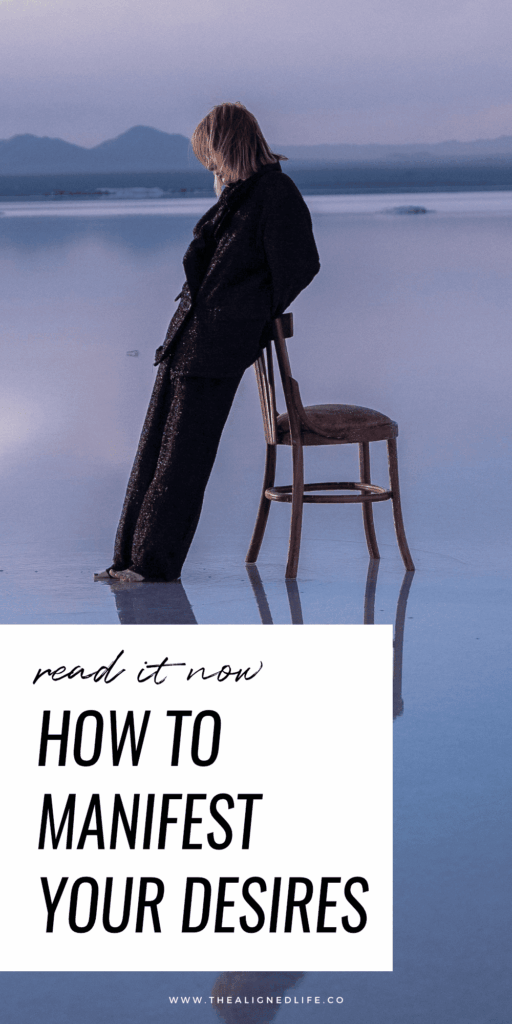 woman leaning on a chair in low water purple mountains reflection | How To Manifest | The Aligned Life Manifestation Blog