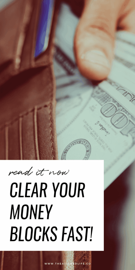hands pulling money out of a brown wallet | Clear Your Money Blocks FAST | The Aligned Life Manifestation Blog