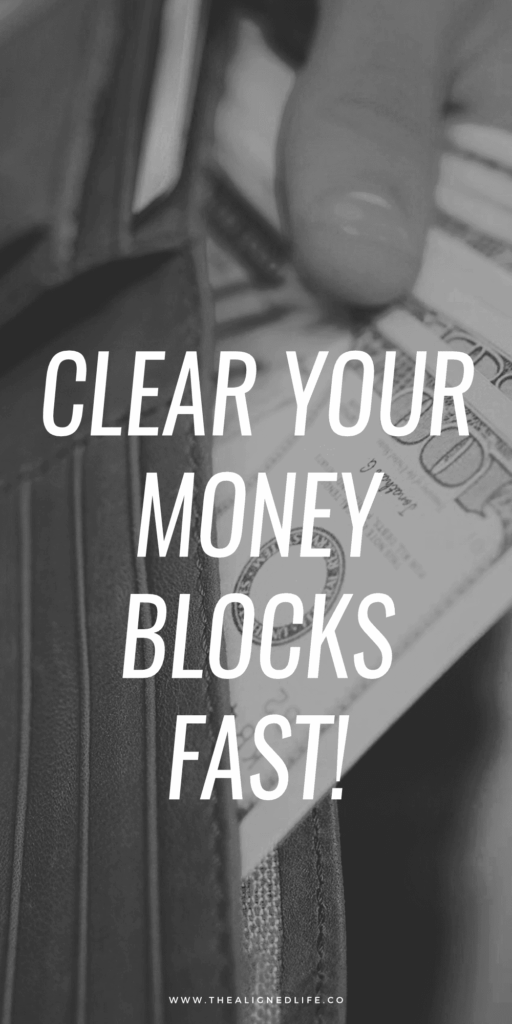 hands pulling money out of a brown wallet | Clear Your Money Blocks FAST | The Aligned Life Manifestation Blog