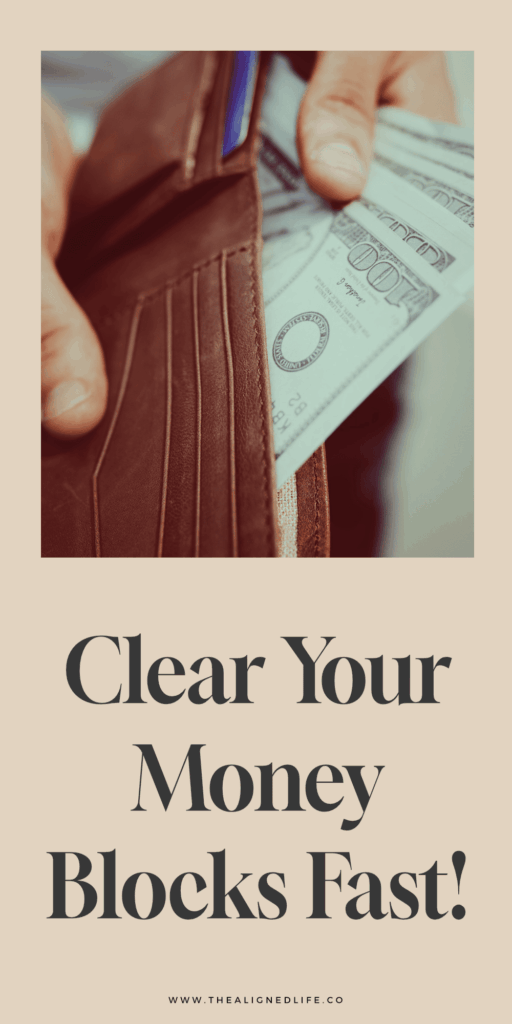 hands pulling money out of a brown wallet | Clear Your Money Blocks FAST | The Aligned Life Manifestation Blog