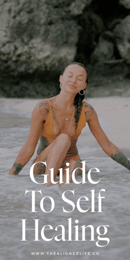 woman with her eyes closed at the beach | Emotional Healing Guide | The Aligned Life Blog