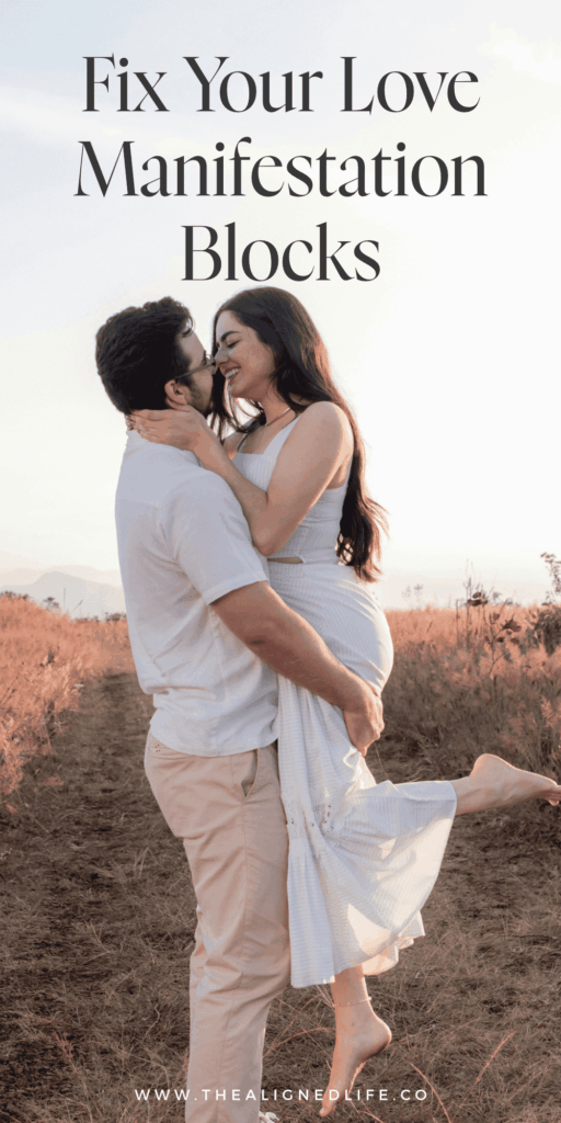 couple wearing white kissing in a field | Top Love Manifestation Blocks (& How To Fix Them!) | The Aligned Life Manifestation Blog