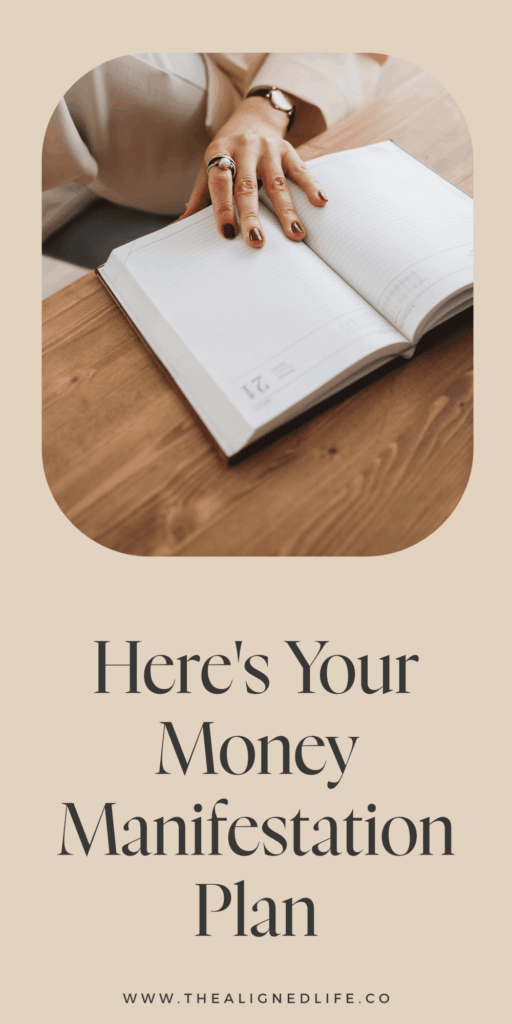 woman with her hand on a planner | Your Money Manifestation Plan | The Aligned Life Manifestation Blog