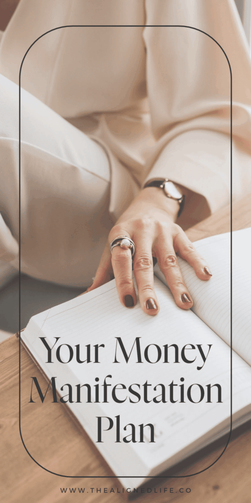 woman with her hand on a planner | Your Money Manifestation Plan | The Aligned Life Manifestation Blog
