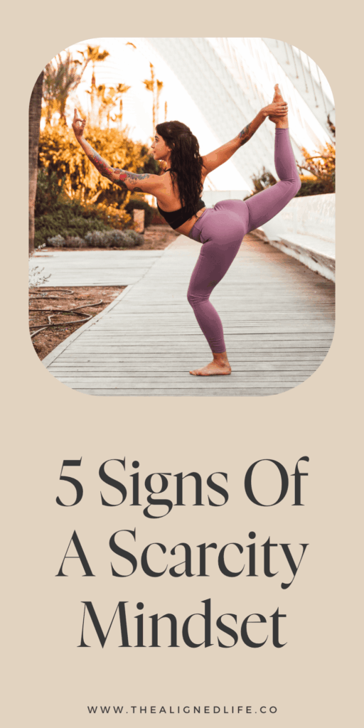 woman doing yoga | 5 Signs Of A Scarcity Mindset | The Aligned Life Manifestation Blog