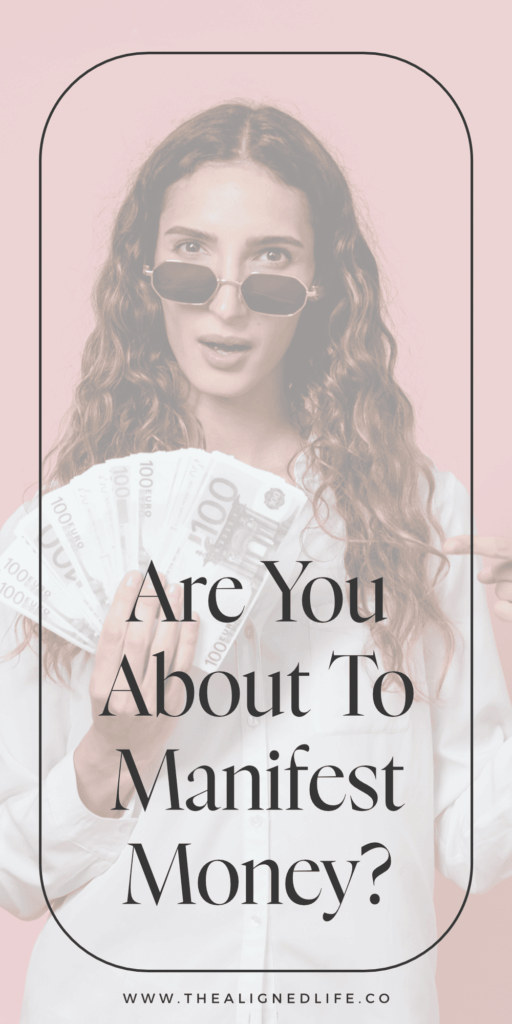 woman holding a handful of cash in front of a pink wall | Signs That Money Is Coming Your Way | The Aligned Life Manifestation Blog