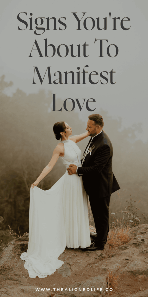 bride and groom in the fog standing on a rock | 7 Signs That You're About To Manifest Love | The Aligned Life Manifestation Blog