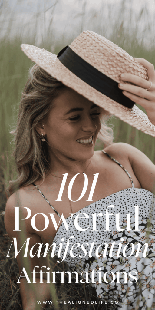 woman in a hat in the grass | 100 Powerful Manifestation Affirmations | The Aligned Life Manifestation Blog
