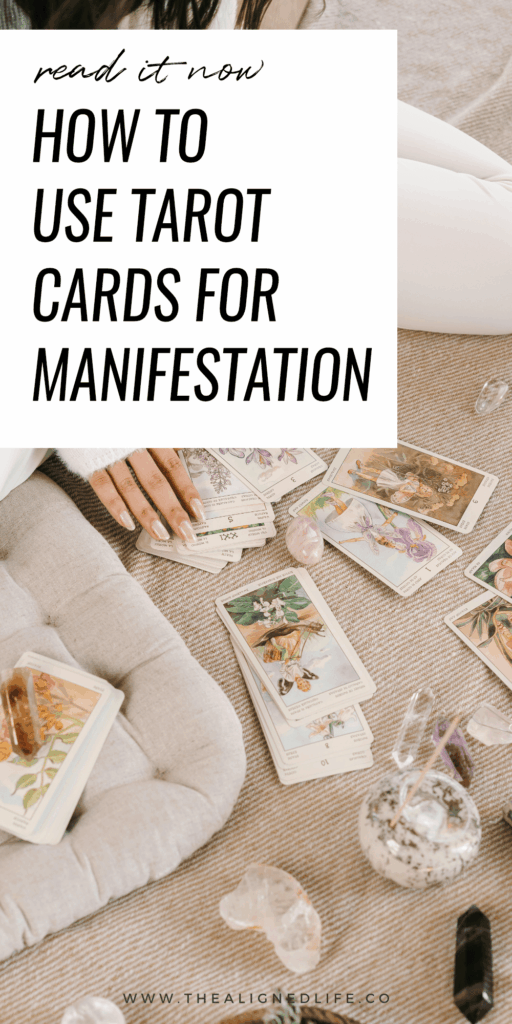 woman sitting on the floor with tarot cards and crystals | How To Use Tarot Cards For Manifestation | The Aligned Life Manifestation + Spirituality Blog