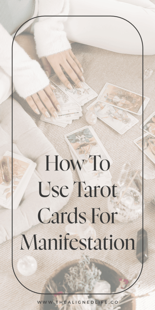 woman sitting on the floor with tarot cards and crystals | How To Use Tarot Cards For Manifestation | The Aligned Life Manifestation + Spirituality Blog