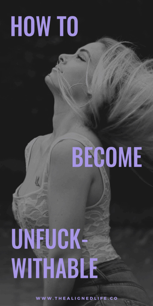 woman with pink hair in a white tank top | How To Become Unfuckwithable | The Aligned Life Manifestation Blog