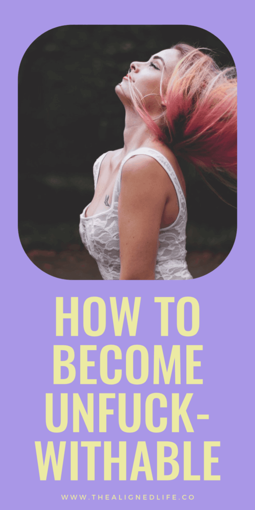 woman with pink hair in a white tank top | How To Become Unfuckwithable | The Aligned Life Manifestation Blog