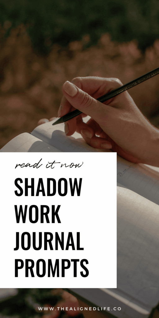 hand with pen and journal | 100+ Shadow Work Journal Prompts