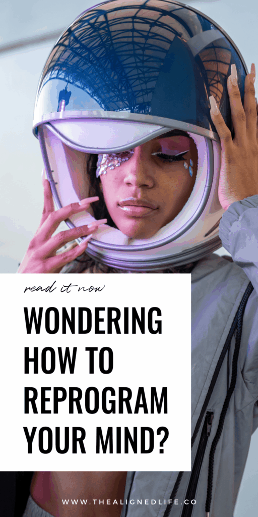 woman wearing an astronaut helmet | How To Reprogram Your Subconscious Mind