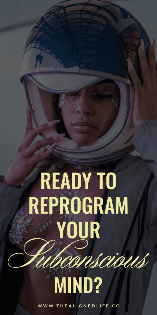 woman wearing an astronaut helmet | How To Reprogram Your Subconscious Mind