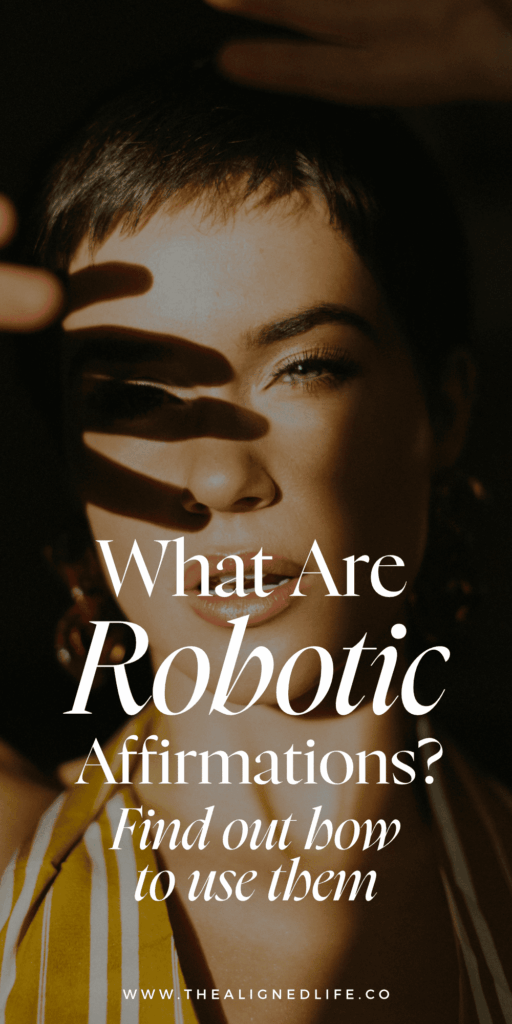 woman with her hand up | How to Use Robotic Affirmations for Manifestation