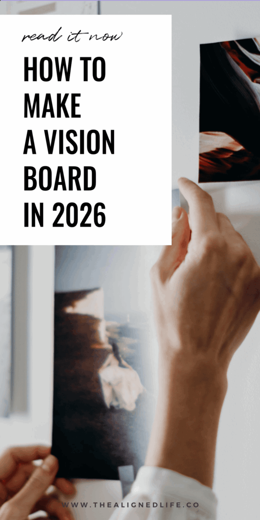 a woman's hands taping a picture to a white wall | How To Make A Vision Board In 2026 For Manifestation