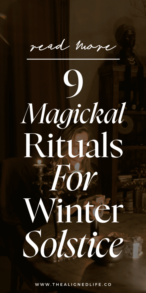 blonde woman sits holding tarot cards surrounded by candles | 9 Rituals For Winter Solstice