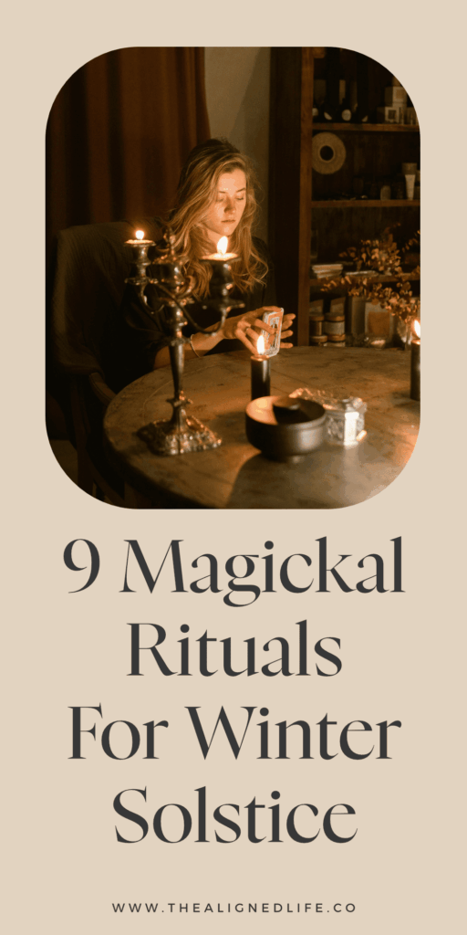blonde woman sits holding tarot cards surrounded by candles | 9 Rituals For Winter Solstice