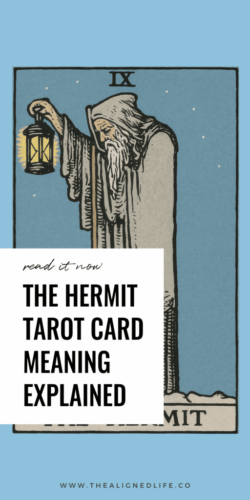 a man with a grey beard holds a lantern and a walking stick | The Hermit tarot card from the RIder Waite deck