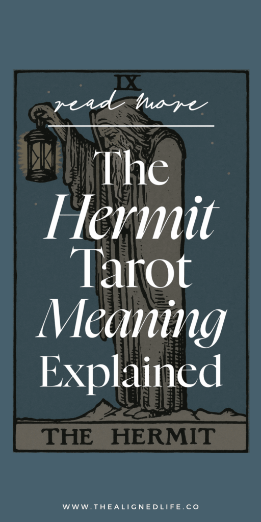 a man with a grey beard holds a lantern and a walking stick | The Hermit tarot card from the RIder Waite deck