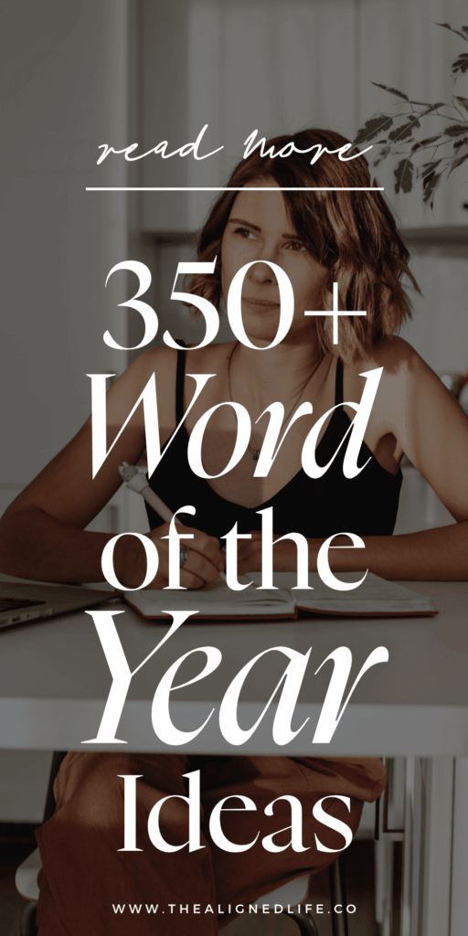 woman with a blonde bob sits at a desk with a pen in her hand | 350+ Word Of The Year Ideas