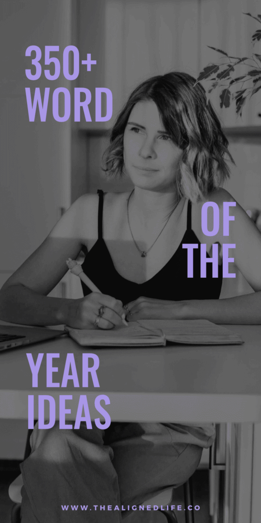 woman with a blonde bob sits at a desk with a pen in her hand | 350+ Word Of The Year Ideas