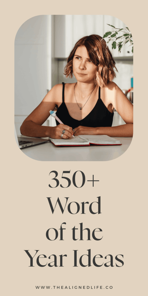 woman with a blonde bob sits at a desk with a pen in her hand | 350+ Word Of The Year Ideas