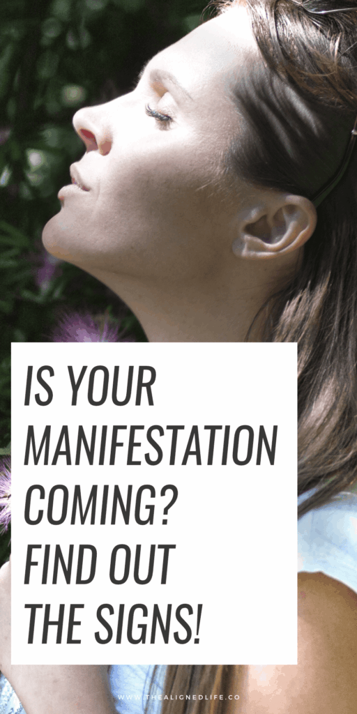 brunette woman with a flower | Signs Your Manifestation Is On Its Way | The Aligned Life Manifestation Blog